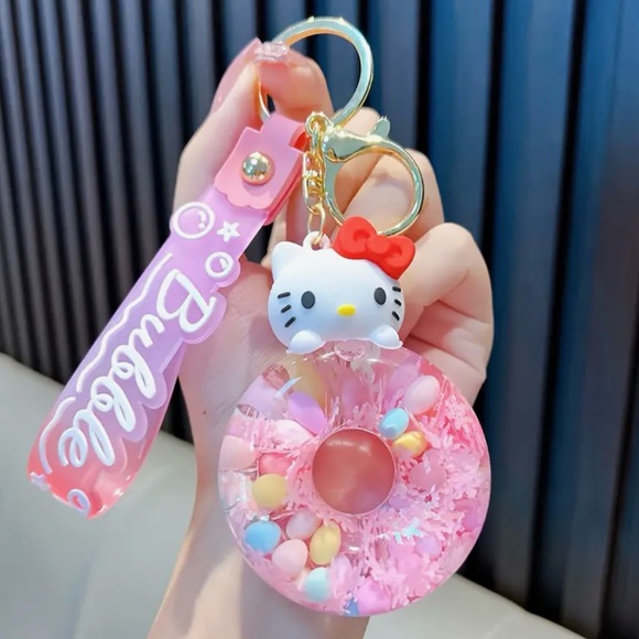 Sanrio Hello Kitty Acrylic Glitter Quicksand Bottle Key Chain Bag Charm - Picture 3 of 7